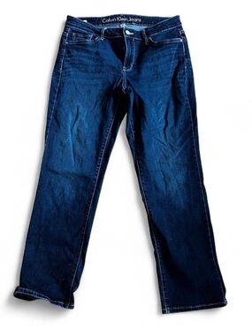 Calvin Klein woman’s dark wash, mid rise, stretchy straight denim Sz 32W 28 Ins